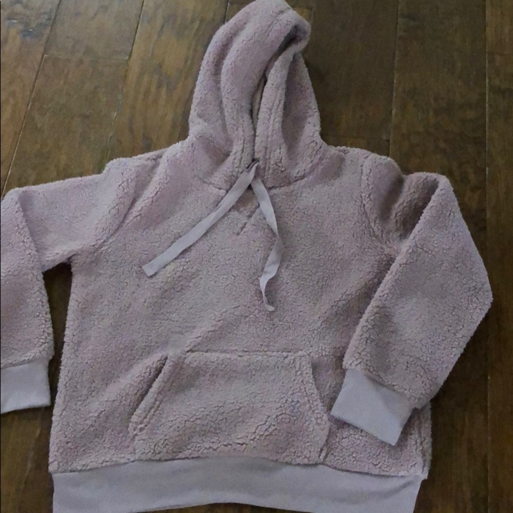 Plush teddy bear type hoodie.